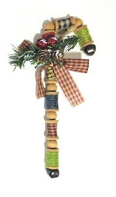 a christmas tree decoration made out of wine corks and other decorations on a white background