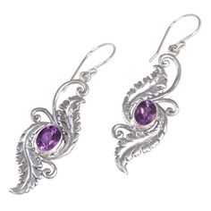 Artisan Wirabhuwana crafts these elegant earrings with a modern Balinese flair, helping to add charm and mystery to any look. Radiant amid sterling silver foliage, these 3.5-carat amethyst dangle earrings cast a spell of beauty. Sterling silver, amethyst Hook earrings High polish finish Handmade in & fairly traded from Indonesia Sea Themed Earrings, Morning Garden, Cast A Spell, Ribbon Jewelry, Jewelry Workshop, Printed Jewelry, Sterling Silver Dangle Earrings, Amethyst Earrings, Shell Earrings