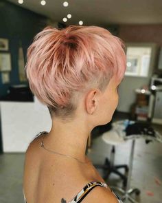 50 Coolest Women's Undercut Hairstyles To Try in 2024 Women's Undercut, Choppy Pixie, Pixie Undercut, Undercut Hairstyles Women, Pixie Haircut Styles, Light Pink Hair, Shaved Undercut, Long Hair On Top