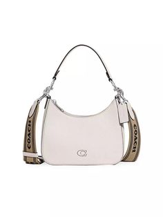 This classic COACH leather hobo bag delivers standout style and functionality. With its detachable coated canvas strap, you can wear it as a chic top-handle bag or customizable crossbody. Featuring buttery soft leather with a lined interior and convenient card slot, it protects your essentials in style wherever Instagram leads you throughout the day. Coach Hobo Bag With Detachable Handle For On-the-go, Coated Canvas Hobo Shoulder Bag With Removable Pouch, Coated Canvas Hobo Bag With Removable Pouch, Versatile Coach Bags With Detachable Handle, Coach Hobo Shoulder Bag With Leather Handles, Coach Hobo Bag With Removable Pouch And Top Handle, Everyday Satchel Shoulder Bag With Arcuate Strap, Coach Hobo Bag With Double Handle, Coach Hobo Bag With Detachable Strap Tote