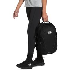 With the help of students, The North Face updated this classic women's minimalist back-to-campus pack with a modern aesthetic and essential features..Dimensions: 11' x 8' x 17.5'.Zip closure.2 exterior water bottle pockets, 360-degree reflectivity, external daisy chains for added lash points.Front compartment simplifies organization for the modern user while maintaining essential features for storage such as secure-zip pockets, a tablet sleeve and a key fob.Padded laptop sleeve protects laptop f Sporty The North Face Standard Backpack, The North Face Sports Backpack, Black The North Face Hiking Backpack, Black The North Face Backpack For Hiking, The North Face Sporty Standard Backpack, The North Face Black Hiking Backpack, Functional The North Face Backpack For Travel, Sporty The North Face Travel Backpack, Sporty The North Face Backpack For Travel