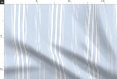 a blue and white striped fabric with an area for the ruler to be placed next to it