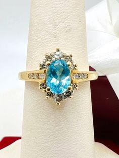 14K White Gold Blue Topaz & Diamond 0.25ct Ring Size 6.25 A perfect gift for your loved one for any special occasion or holiday! Total Ring Weight: 3.00g Ring Length: 24.88mm Ring Width: 20.22mm Gemstone: Diamond Total Diamond: 0.25ct Item will be placed into a gift box. * Turquoise Sapphire Anniversary Ring With Accent Stones, Turquoise Sapphire Ring With Accent Stones For Anniversary, Turquoise Sapphire Ring For Anniversary, Blue Birthstone Ring With Diamond Accents For Gift, Oval Blue Topaz Diamond Ring As Gift, Oval Blue Topaz Diamond Ring Gift, Blue Birthstone Ring With Diamond Accents For Anniversary, Blue Birthstone Ring Stamped 14k As Gift, Anniversary Turquoise Topaz Ring With Accent Stones