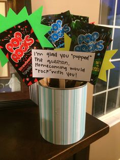 a cup with some candy in it sitting on a table