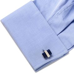 Keep it simple and elegant with the Silver Wrapped Navy Blue Catseye Cufflinks. The navy blue catseye is cut in a soft rectangle shape and wrapped in a silver metal band around the center. Cufflinks are silver plated base metal with bullet back closure. Modern Rectangular Cufflinks With Polished Finish, Modern Rectangular Polished Cufflinks, Polished Rectangular Cufflinks, Silver Rectangular Cufflinks For Business, Modern Rectangular Cufflinks For Business, Classic Blue Jewelry For Business, Classic Blue Cufflinks With Polished Finish, Classic Rectangular Cufflinks For Business, Rectangular Cufflinks For Business