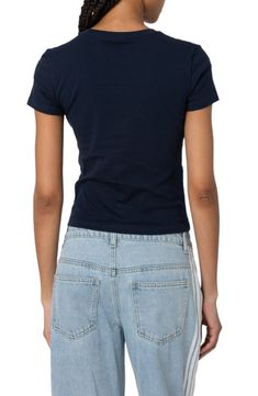 An exceptionally neat bow is tied at the front of this graphic T-shirt cut from soft stretch cotton. Crewneck Short sleeves 95% cotton, 5% spandex Machine wash, dry flat Imported Trendy Graphic Print Tops In Elastane, Casual Graphic Print Tops In Elastane, T Shirt Cut, Cut Tshirt, Nordstrom Store, Cut Shirts, Anniversary Sale, Stretch Cotton, Graphic T Shirt