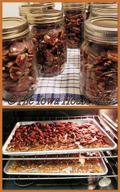 there are many jars filled with nuts on top of a table and in the oven