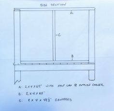 a drawing of a cabinet with measurements for the top and bottom section on it's side