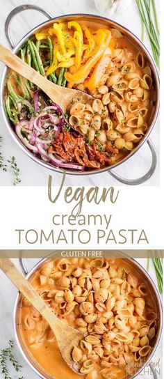 vegan creamy tomato pasta in a pan with wooden spoons