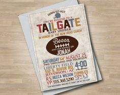 a football themed baby shower is shown on a wooden surface with the words tailgate