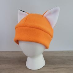 This handmade fleece hat with fox ears is great for cold days, cosplay, or just for fun! The ears are designed to remain standing even when moving around. Sizing: Child - 20" Big Kid/Adult Small - 21" Adult Medium - 22" Adult Large - 23" For best fit, measure head circumference just above eyebrows, at the largest part of the head. If you need a size that is not listed please message me and I would be happy to make it to size! Since items are not pre-made, please allow up to 3 days for creation b Winter Costume Cat Ears Hats And Headpieces, Novelty Cat Ears Costume Hats For Winter, Fox Hoodie With Ears, Fox Ear Hat, Winter Cat Ears Hat With Ears Detail, Fox Hat Pattern, Fleece Beanie, Fox Hat, Fox Ears