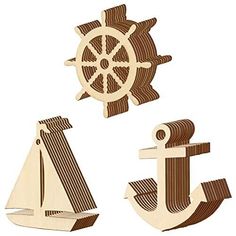 two wooden cutouts of ships and anchors