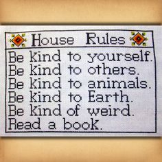 a cross stitch pattern with the words house rules and an image of a cat on it