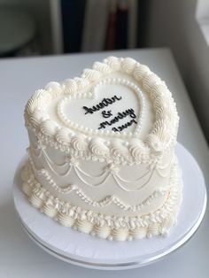 a heart shaped cake on a white plate