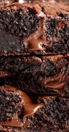 chocolate brownies stacked on top of each other with one bite taken out of it