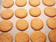 twelve cookies on a baking sheet ready to be baked