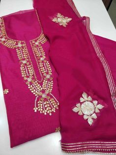 Item Overview ATHARVA Hand Embroidery Salwar Kameez Majenta Rani/Gota Patti Work/Chiffon Chinnon Dupatta /Custom Stitch Unstitch/Gift/Anarkali Dno. CH1759 Fabric:  * Shirt: Chanderi Silk- Embroidered Neck/ 2.5 Mts Beautiful Hand Embroidery/Gota Patti Work * Dupatta: Chiffon Chinnon Dupatta 2.5Mts/Gota Patti Work/Gota Border/Lace/Latkans Tassels  * Bottom Santoon Silk 2.5 Mts. *Anarkali Style -  - Increased Embroidery All Over the Panel -4.5Mts to 5 Mts Shirt Fabric used -4.5Mts to 5 Mts Lining F Pink Chinon Unstitched Suit With Gota Work, Festive Pink Embroidered Fabric With Gota Work, Fitted Gota Work Chinon Dupatta, Pink Semi-stitched Salwar Kameez With Gota Work, Gota Patti Embroidery, Ladies Salwar Kameez, Patiala Salwar Kameez, Gota Patti Work, Border Lace