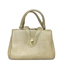 This Vintage 50s 60s MCM Beige Leather Handbag boasts a retro charm with gold hardware and turn lock closure. Features 3 large pockets, 2 with locking closure.  The metal on the closures is scratched (please see photos).  Leather is in pristine condition. Vintage Handbag, Beige Leather, Gold Hardware, Turn Lock Closure, 50s Handbag, 60s Handbag, MCM Bag, Vintage Leather Purse, Retro Handbag, Beige Purse, Leather Handbag, Gold Lock Purse, Vintage Accessories *Please see photos for measurements. *Please message with any questions about this item. Mcm Bag, Beige Purse, Beige Purses, Retro Handbags, Mcm Bags, Vintage Handbag, Purse Vintage, Vintage Handbags, Vintage Accessories