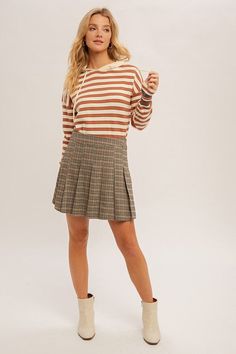 Your new fall favorite is here! Our Honey Plaid Pleated Mini Skirt features a classic design with the cutest detail. Pair with a sweater and knee high booties for the perfect fall activities outfit! Fabric Contents: 97% POLYESTER 3% SPANDEX Model: HEIGHT 5'8" WEARING A SMALL SIZE Activities Outfit, Plaid Pleated Mini Skirt, Plaid Pleated Skirt, Fall Activities, Honey Brown, Plaid Mini Skirt, Brown Plaid, Fall Favorites, Kimono Jacket