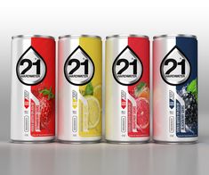 three cans of energy drink with fruit and lemon