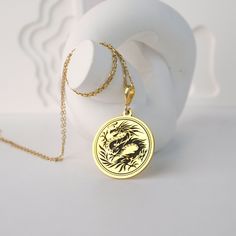 Elevate your style with this stunning medallion dragon necklace! Crafted with intricate detail, the dragon medallion serves as a bold statement piece that is sure to turn heads. This eye-catching necklace is perfect for dragon lovers or anyone looking to add a touch of mystique to their outfit. Whether you're dressing up for a special occasion or simply adding a unique touch to your daily look, this medallion dragon necklace is a must-have accessory that will bring a touch of whimsy to any ensem Dragon Medallion, Chinese Calendar, Chinese Year, Dragon Necklace, Dragon Lover, Necklace Statement, The Dragon, Statement Jewelry, Statement Pieces