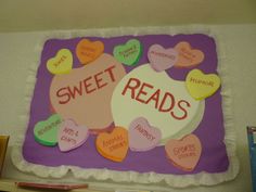 a bulletin board that says sweet reads with hearts and words written on the front side