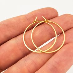 Thin and delicate with a chic flat hammered finish, these gorgeous solid gold hoop earrings offer you the chance to elevate your outfit with classic beauty while keeping your accessories light and airy. Christmas Presents For Wife, Saint Helens, Presents For Wife, Hammered Gold, Jewelry Christmas, Threader Earrings, Handcrafted Earrings, Gold Wire, Recycled Gold