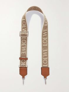 LOEWE Anagram leather-trimmed canvas-jacquard bag strap Beige Logo Shoulder Strap For Everyday Use, Luxury Beige Bag Strap For Everyday Use, Luxury Beige Leather Bag Strap, Luxury Beige Adjustable Bag Strap, Beige Logo Crossbody Bag Strap, Designer Beige Bags With Logo Strap, Beige Logo Strap For Crossbody Bag, Beige Travel Bag With Logo Strap, Beige Crossbody Bag Strap With Logo