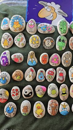 several rocks with cartoon characters painted on them