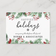 a holiday card with pine branches and berries on it, says happiest holidays