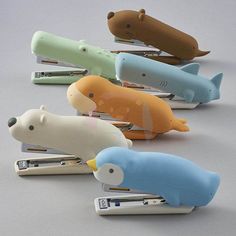 four different colored animal shaped hair clips