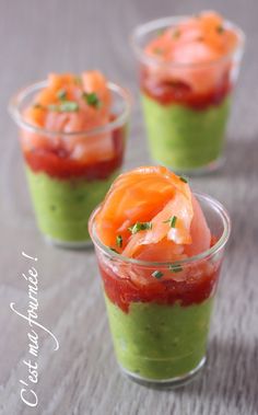 three small cups filled with food on top of a table