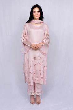 Pastel pink kurta with floral cutwork and sheer sleeve hem detailing. Paired with tonal pant and kota dupatta.
Component: 3
Type Of Work: Floral
Neckline: Round
Sleeve Type: Full sleeves
Fabric: Modal Satin, Kota, Organza
Color: Pink
Other Details: 
Sheer sleeve hem
Nalki work or neckline
Scallop hem on kurta
Occasion: Puja - Aza Fashions Feminine Resham Embroidery Sets For Festive Occasions, Party Salwar Kameez With Lace Work, Pink Georgette Kurta With Self Design, Pink Self Design Georgette Kurta, Pink Self-design Georgette Kurta, Summer Pink Palazzo Set With Sheer Dupatta, Pink Kurta With Sheer Dupatta For Spring, Elegant Salwar Kameez With Lace Work For Spring, Elegant Spring Salwar Kameez With Lace Work