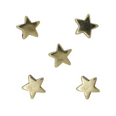 three small gold stars on a white background