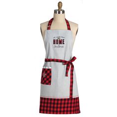 a red and white apron with the words home on it