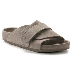 The casual BIRKENSTOCK Kyoto stands out with its envelope design and individually adjustable hook and loop closure. Giving this casually stylish sandal a slipper like fit and feel. This exquisite version features a footbed fully lined with luxuriously smooth color coordinating leather. The upper is made from especially soft suede. Anatomically shaped cork-latex footbed; exquisite Upper: suede Footbed lining: smooth leather Sole: EVA Details: individually adjustable buckle “Made in Germany” Birkenstock Kyoto, Birkenstock Styles, Black Birkenstock, Calf Muscles, Stylish Sandals, Envelope Design, Birkenstock Shoes, Leather Shops, Womens Sandals Flat