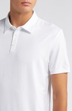 This polished take on the polo is crafted from lightweight lyocell jersey with added stretch to retain its shape. 26" length (size medium) Button half-placket Spread collar Short sleeves 93% Tencel® lyocell, 7% spandex Tencel lyocell is a sustainably produced fiber made with closed-loop processing Dry clean or machine wash, tumble dry Imported Classic Polo Collar Tops With Stretch, Classic Stretch Polo Shirt In Solid Color, Classic Stretch Polo Shirt, Fitted Casual Polo Shirt With Spread Collar, Stretch Polo Shirt For Work, Classic Golf Tops With Placket, Classic Collared Polo Shirt With 4-way Stretch, Classic Stretch Collared Polo Shirt, Fitted Collared Golf Polo Shirt