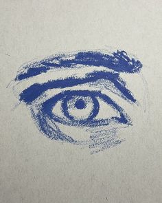 an eye drawn on paper with blue ink