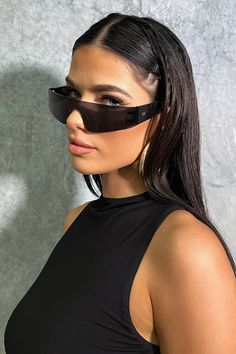 Fashion forward with the hot in Zora sunnies! Your go to festival babe. They offer a sleek straight frame top, a black silver lens and black arms with a TSF logo. Rave Glasses, Black Silver, Sunnies, Fashion Forward, Sleek, Festival, Sunglasses, Frame, Silver