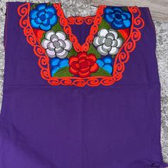 Mexican Top Embroidered Blusa Mexicana Purple Casual Embroidered Purple Blouse, Casual Purple Embroidered Blouse, Purple Floral Embroidered Crew Neck Top, Purple Crew Neck Top With Floral Embroidery, Purple Embroidered Short Sleeve Top, Purple Floral Embroidered Beach Top, Traditional Purple Cotton Top, Purple Floral Embroidery Beach Top, Casual Purple Top With Floral Embroidery