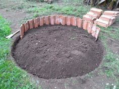 a pile of dirt sitting in the middle of a yard