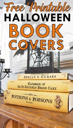 three books sitting on top of a wooden table with the title free printable halloween book covers