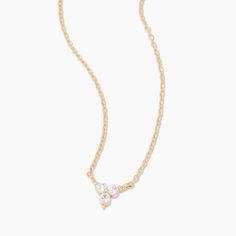 Add a touch of elegance to any outfit with the Emery 14k Gold Diamond Necklace. This 14k gold, this necklace features a trio of sparkling diamonds, adding a touch of luxury to your look. Perfect for any occasion, this necklace is a must-have for any jewelry collection. Available in 14k yellow gold Pendant size: 4mm x 4mm Lab Grown Diamonds Diamond size: 1.7mm round diamond 16" cable chain with 2" extender Spring Ring closure SKU: BYND0013 Elegant Three Stone Cubic Zirconia Necklace, Elegant Three Stone Diamond Necklace, Fine Jewelry Diamond Three-stone Necklaces, Three Stone Cubic Zirconia Fine Jewelry Necklaces, Elegant Cubic Zirconia Three-stone Diamond Necklace, Delicate Three-stone Diamond Jewelry, Elegant Diamond White Three Stone Necklace, Elegant Cubic Zirconia Necklace With Three Stones, Elegant Three Stone Cubic Zirconia Diamond Necklace