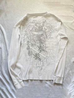 ⚡Buy 2023 Vintage Print Long Sleeve Tee White L under $19.00 in Tops&Tees at AnotherChill.com Online. Style: Casual/Street/Vintage/Hip Pop. Fabric Content: Polyester. Fit Type: Loose Fit. Neckline: Crew Neck. Sleeve Length: Long Sleeve. Casual Street Style: Embrace the laid-back vibes with this vintage street print tee. Its casual, street, and vintage style make it a must-have for your everyday wardrobe. Whether you're hanging out with friends or exploring the city, this tee will keep you lookin Outfits To Buy Online, Affliction Women Outfits, Long Sleeve Shirts Aesthetic, Long Sleeve Aesthetic, Jeans Outfit Summer, 2000s Outfits, Crop Top Dress, Street Look, Print Tee