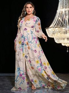 Step into a world of floral elegance with our Enchanting Blooms Plus-Size Floral Print Lantern Sleeve Chiffon Dress. This exquisite piece is a celebration of grace and style, designed to flatter and embrace your curves. The lantern sleeves add a touch of whimsical charm, while the split thigh detail offers a hint of allure, making this dress a perfect blend of modesty and modernity. Color: Multicolor Style: Elegant Pattern Type: Floral Pattern Type: All Over Print Sleeve Length: Long Sleeve Deta Floor-length Floral Chiffon Wedding Dress, Flowy Floor-length Chiffon Dress With Floral Print, Floor-length Floral Print Chiffon Wedding Dress, Floor-length Floral Print Chiffon Dress, Flowy Floral Print Floor-length Chiffon Dress, Patterned Long Sleeve Floral Kaftan, Spring Floral Print Floor-length Kaftan, Flowy Floral Print Maternity Dress, Long Sleeve Floral Print Maternity Dress