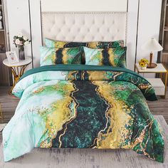 a bed covered in green and yellow comforters