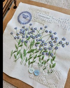 a close up of a piece of cloth with flowers on it