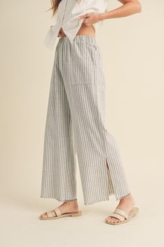 DescriptionThe Seaside Striped Linen Pants feature: Raw edge Side pockets Side slits Wide leg Elastic waistband FitRelaxed, true to size MaterialLinen / Cotton Chic Pull-on Style Bottoms For Daywear, Relaxed Fit Wide Leg Pull-on Bottoms, Ankle-length Loungewear Bottoms With Pockets, Daywear Wide Leg Pull-on Bottoms, Relaxed Fit Bottoms With Pockets For Daywear, Wide Leg Bottoms With Pull-on Style For Daywear, Wide Leg Pull-on Bottoms For Daywear, Ankle-length Lounge Pants With Pockets, Wide Leg Bottoms With Pockets For Daywear