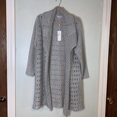 Baciano Gray Crochet Patterned Cardigan Women's Size Xl. New With Tags! Materials: 100% Acrylic. Hand Wash Only, Lay Flat To Dry. Measurements: Pit To Pit Laying Flat 20.” Shoulder To Bottom Of Hem 36.” Arm Length 23.” Beautiful And Cozy! Fall Open Knit Cardigan, Fall Open Knit Cardigan For Daywear, Open Knit Cardigan For Fall Daywear, Open Knit Long Sleeve Sweater For Daywear, Open Knit Sweater For Daywear, Open Knit Sweater For Fall Daywear, Open Knit Sweater For Daywear In Fall, Open Knit Long Sleeve Cardigan For Daywear, Spring Open Knit Sweater Coat For Layering