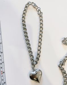 LOLA: Chunky Curb Chain Heart Necklace / Stainless Steel / - Etsy Metal Heart Necklace With Chunky Chain, Chunky Heart Necklace For Valentine's Day, Chunky Chain Heart Metal Necklace, Heart Shaped Silver Chain Necklace, Silver Heart Shaped Chain Necklace With Chunky Chain, Heart-shaped Silver Chain Necklace, Valentine's Day Metal Heart Necklace With Chunky Chain, Silver Heart Chain Necklace, Chain Heart